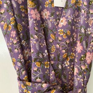 Floral maxi tie waist dress. It has a high slit. Never worn